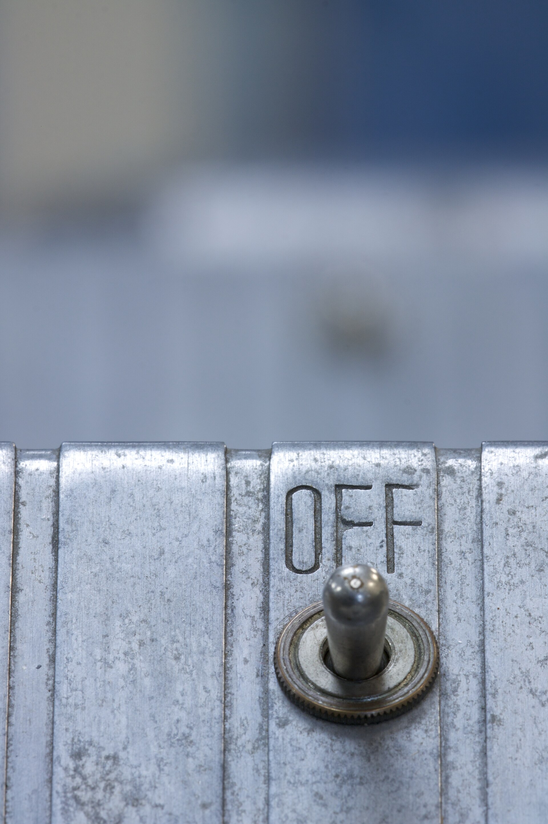 Figure 3 — 3 — A panel-mount toggle switch with a stamped legend, on the panel of an IBM 026 keypunch. The control vocabulary of the mid-century instrument panel — bat-handle toggles, rotary switches…