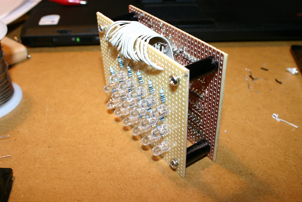 Figure 3 — 3 — A real grid of diffused, evenly-lit square LED cells (a stand-in, not a TIX clock): a maker's binary clock, which — like a TIX face — reads time from a grid of coloured LED cells, thou…