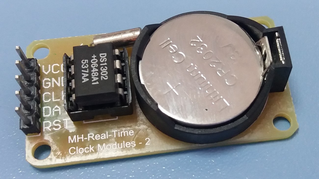 Figure 4 — 4 — A DS1302 real-time-clock chip — the trickle-charge RTC the uTixClock uses to hold the time through a power-off. It keeps time but has no temperature compensation, so it drifts more tha…